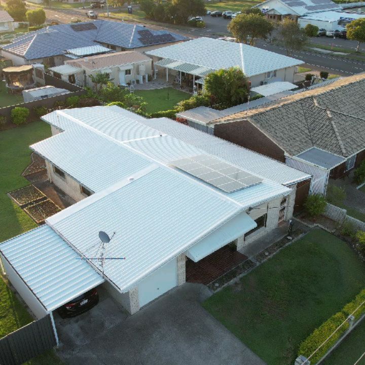 Aerial view of an ELEV8 freshly installed white metal roof